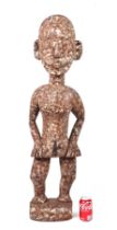 A large African carved wooden female fertility figure, approx 103cms high.