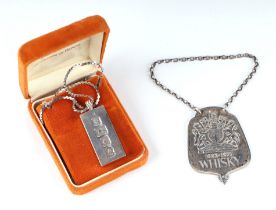 A modern silver ingot pendant, 59g, London 1977; together with a Queen Elizabeth II limited
