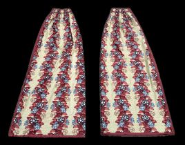 A pair of lined curtains with floral decoration, 235cms drop and width 110cms (2).