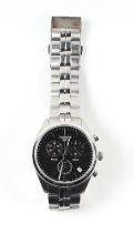 A Tissot Chronograph wristwatch, the black dial with three subsidiary seconds dials and date