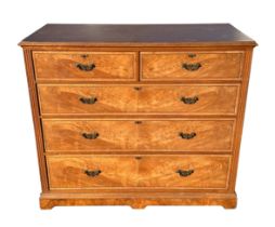 An early 20th century Maple & Co. ash chest of two short and three graduated long drawers, on a