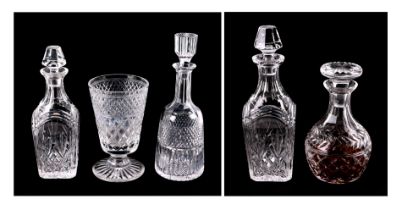 A Stuart Crystal decanter, together with three other decanters and a cut glass vase (5).