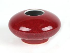 A Chinese flambe glaze brush washer of compressed globular form, 9cms diameter.