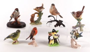 A small collection of ceramic birds to include Beswick Greenfinch, Goebbels Robin and others (8).