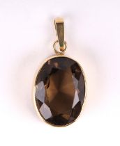 A 1970's 18ct gold and smoky quartz pendant, 10g.