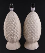 A pair of plaster pineapple table lamps, 34cms high (2).