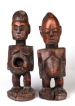 A pair of tribal lobi male and female carved wooden figures, largest 30cm high ( 2)