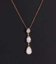 A 9ct rose gold white agate and diamond set pendant necklace, 9.6g.