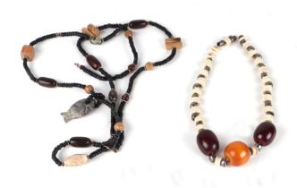 Two ethnic bead necklaces.