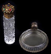 A Victorian glass scent bottle with silver collar and cap, 6cms high and another similar, 4cms