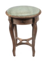 A limed oak occasional table with marble top and single drawer, 46cms diameter.