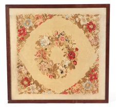 An Aubusson style floral tapestry panel, 63 by 65cms, framed.