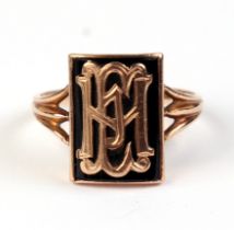 A 9ct gold gentleman's signet ring, the black rectangular panel with initials, approx UK size 'S',