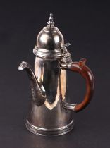A late Victorian Georgian style Britannia Standard silver coffee pot with side treen handle, foliate