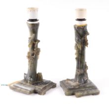 A pair of Chinese figured green soapstone table lamps depicting birds perched on a tree trunk, 21cms