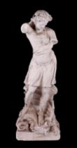 After the antique: A large cast plaster statue depicting a figure draped in a robe, on a plinth