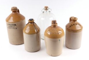 A stoneware flagon impressed 'John Folliott Brewer Wine & Spirit Merchant, Salisbury', 27cms high;