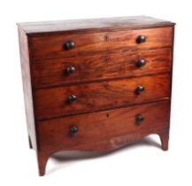 A Victorian mahogany chest of four graduated long drawers, on bracket feet, 102cms wide.