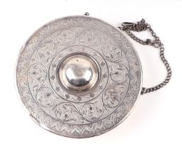 A South East Asian silver (tested) gong with scrolling foliate decoration, makers mark H.T. 15cm