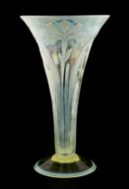 A large Art Nouveau Vaseline glass trumpet vase decorated with irises, 30cms high. Condition