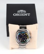 A vintage Orient Crystal day / date automatic 21 jewel gentleman's wristwatch, the blue dial with