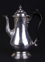 A George II baluster coffee pot, initialled 'WMN', London 1747 and maker's mark for Thomas