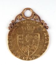 A George III 1798 Spade Guinea on a yellow metal pendant mount, total weight 9g.