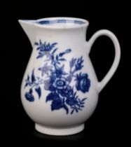 An 18th century Worcester First Period blue & white sparrow beak cream jug, three flowers pattern,