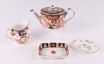 A Crown Derby Imari pattern teapot and cover, approx 9cms high; together with a similar milk jug;