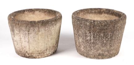 A pair of well weathered reconstituted stone circular planters, 40cms diameter (2).