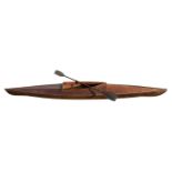 A 1930's wooden single scull rowing boat, probably a Percy Blandford PBK14 kayak, 448cms (14ft