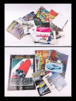 A quantity of assorted motorsport related calendars, race programmes and other ephemera to include