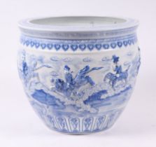 A large Chinese blue & white goldfish bowl decorated with figures in relief and internally decorated