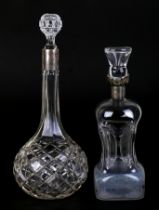 A late Victorian cut glass decanter with silver collar, Sheffield 1899, 29cms high; together with