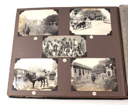 An early 20th century photograph album covering various countries including Ceylon, Tibet,