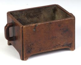 A Chinese bronze rectangular censer with impressed character mark, 10cms wide.
