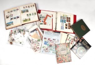 A quantity of stamp albums; together with a large quantity of loose stamps.