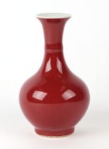 A Chinese sang de boeuf baluster vase, 15cms high.