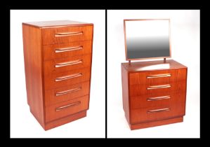 A G-Plan Fresco teak tallboy chest of six drawers, 53cms wide; together with a matching dressing