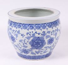 A Chinese blue & white goldfish bowl decorated with flowers and foliage, 41cms diameter.