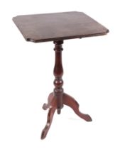 A mahogany occasional table on turned column and tripod base.