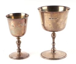 A silver goblet with baluster form stem, Birmingham 1971, 227g; together with another similar,