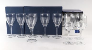 A set of four Villeroy & Boch wine glasses; together with other wine glasses.