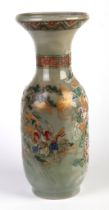 A late 19th century Japanese vase decorated with a gilded tiger with mounded flowers, on a celadon