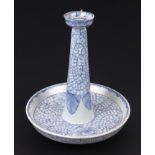 A Chinese blue & white candlestick, approx 25cms high.