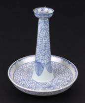 A Chinese blue & white candlestick, approx 25cms high.