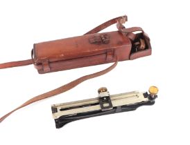 A 1938 dated Mark VI sight in its leather case with shoulder strap. Marked with the War Department