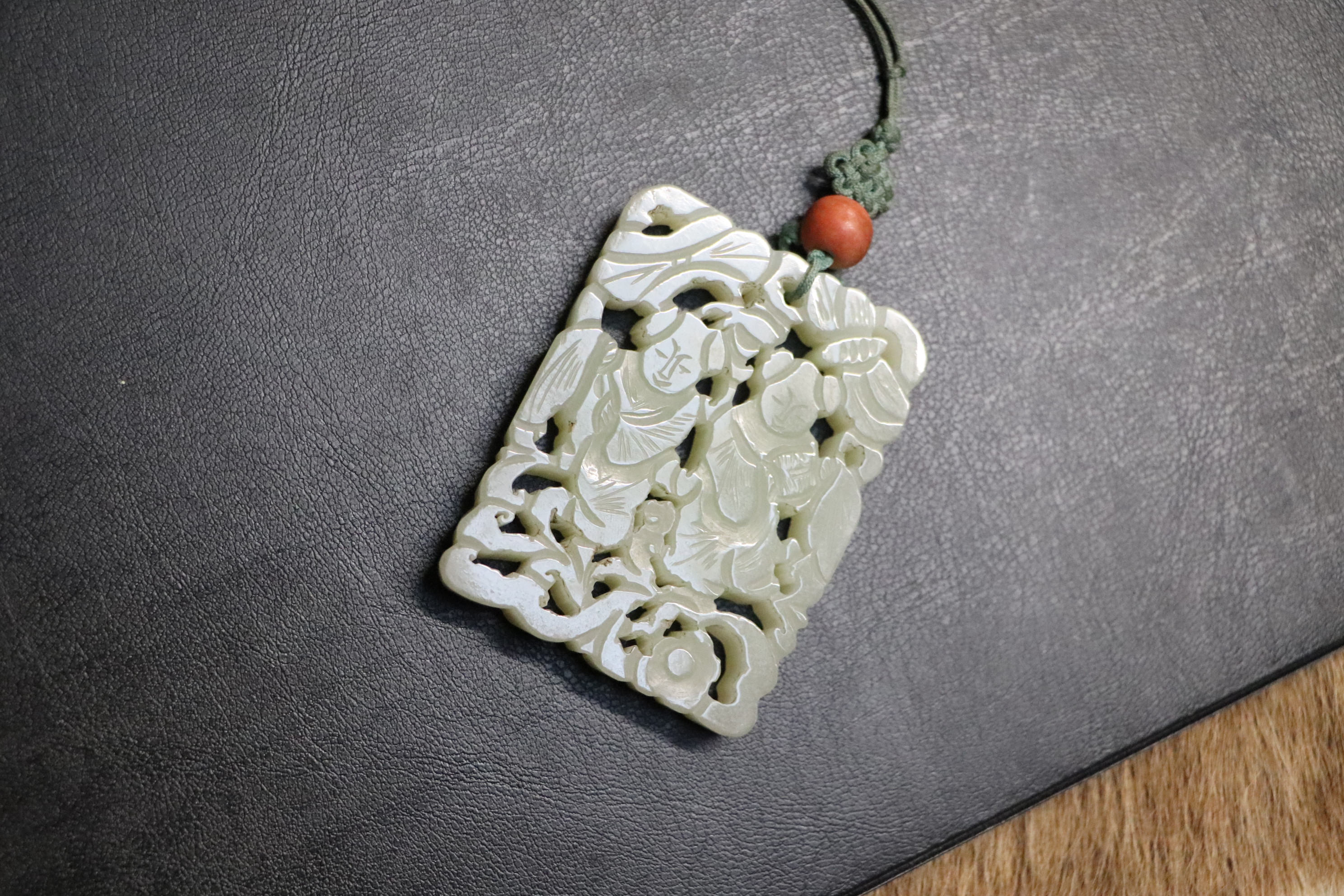A Chinese pierced jade pendant, 5 by 6.5cms. Condition Report Good overall condition with no visible - Image 6 of 13