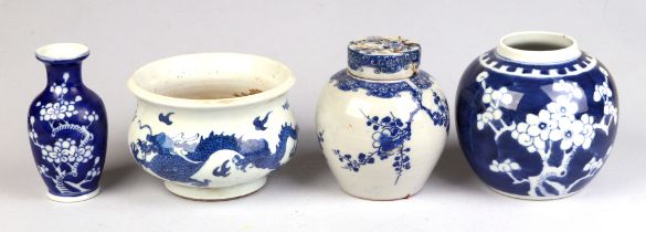 A Chinese blue & white bowl decorated with dragons amongst clouds, 12cms diameter; together with a