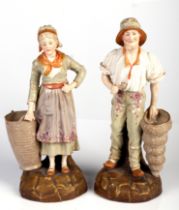 A pair of Ernst Weiss Thun porcelain spill vase figures of fisherfolk with baskets, each approx
